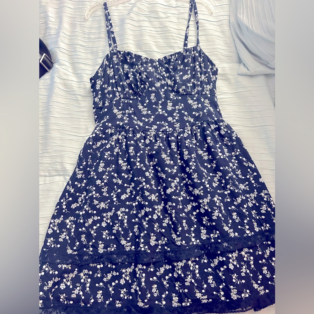 Hollister-Large No tags worn once. Navy mini sundress with white flowers.